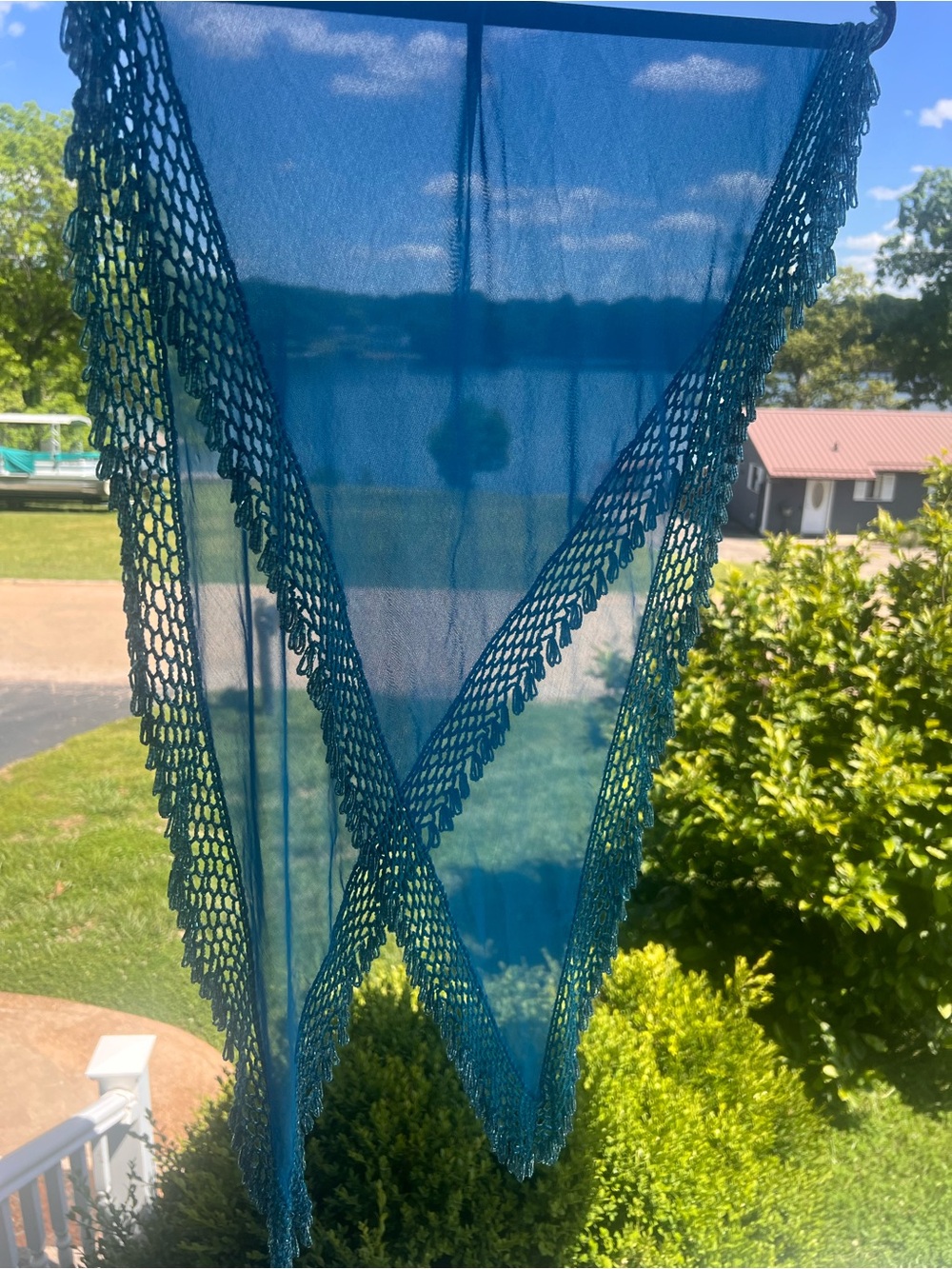Sheer blue textile with beaded crochet scarf.